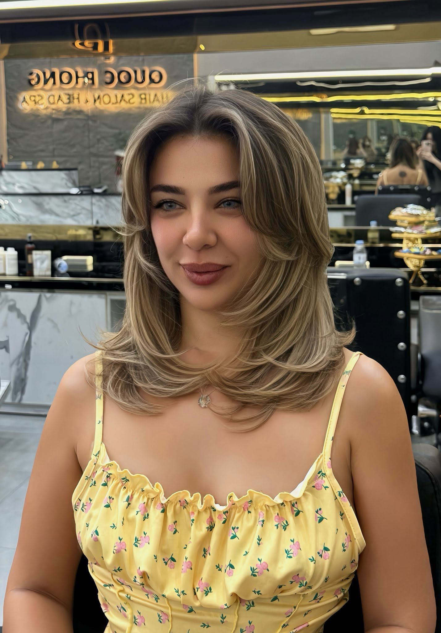 Medium layered cut with curtain bangs